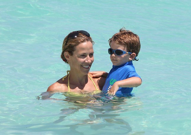 Sheryl Crow swimsuit yellow bikini top