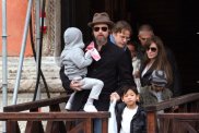 Brad Pitt hat black jacket Angelina Jolie sunglasses long coat