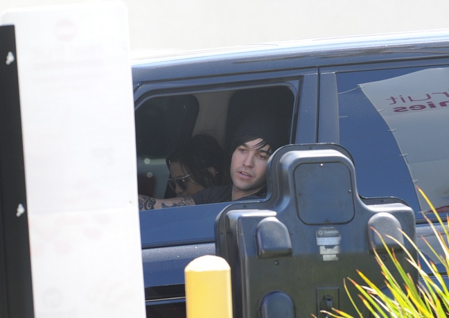 Pete Wentz, black hat, black tshirt, drive-thru window, black car