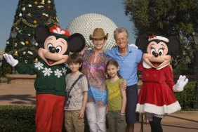 Michael Douglas, Catherine Zeta-Jones with Mickey Mouse and their children