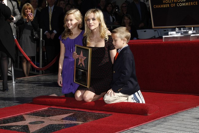 reese witherspoon black polka dot dress, red peep-toe heels