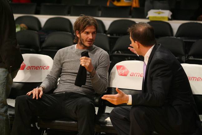 David Beckham, gray shirt, black jeans