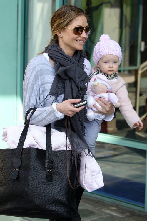 Rebecca Gayheart, gray scarf, black bag, sunglasses