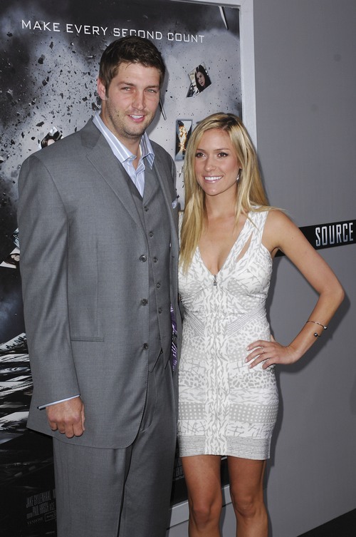 Kristin Cavallari white dress, Jay Cutler gray suit