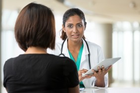 woman talking to doctor