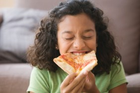 Girl Eating Pizza