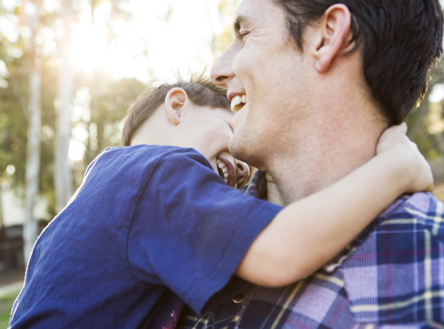 father-son-hug-outside