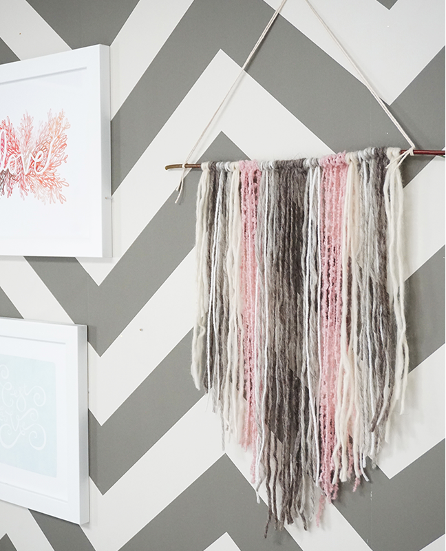 grey, pink, white yarn tapestry