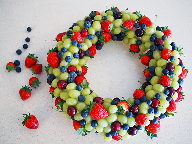 Make an edible fruit Christmas wreath