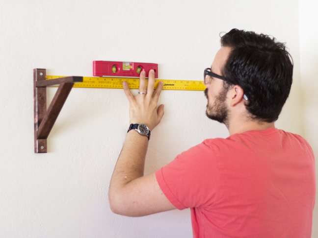 level-measuring-tape-hanging-shelf-bracket