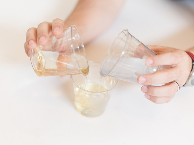 pouring-two-cups-of-resin-mix