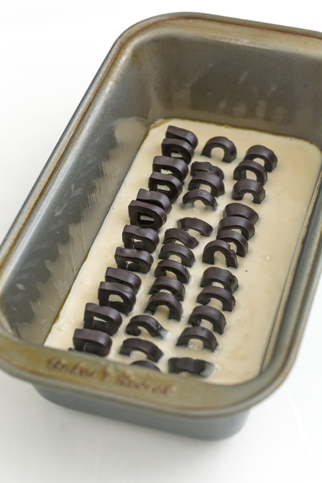 letters in batter in cake pan