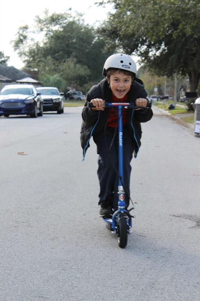 boy on scooter