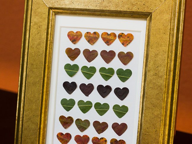 graphic heart art in gold frame