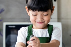 kid involved in the kitchen