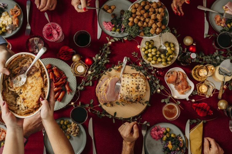 A dinner table full of some of the most popular dishes for Christmas feast.