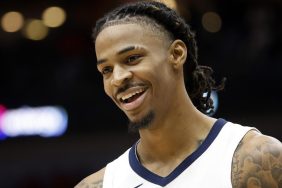 Ja Morant #12 of the Memphis Grizzlies looks on while playing the New Orleans Pelicans at Smoothie King Center on December 19, 2023 in New Orleans, Louisiana.