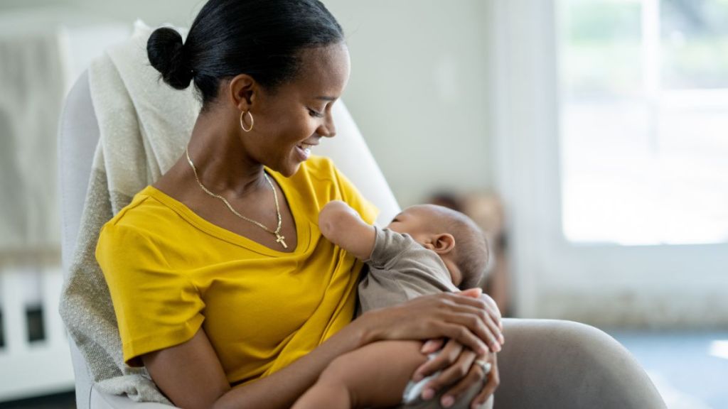 Mother breastfeeding her infant