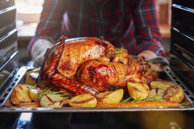 Roasting Turkey in the Oven on a sheet pan for Thanksgiving Dinner.