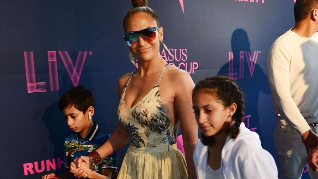 Jennifer Lopez (C) with children Emme Maribel Muñiz and Maximilian David Muñiz at the 2020 Pegasus World Cup Championship Invitational Series at David Grutman's LIV Stretch Village on January 25, 2020 in Hallandale Beach, Florida.