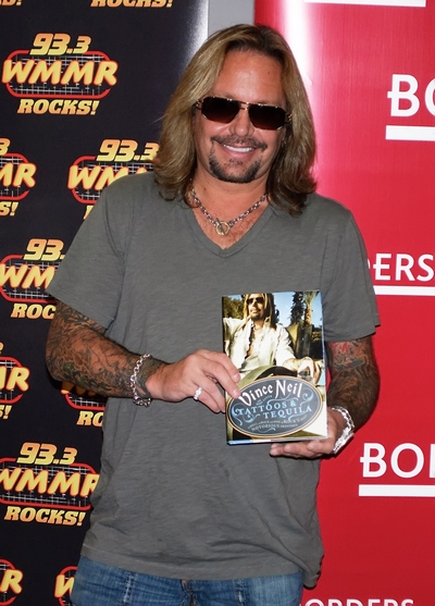 Vince Neil, gray t-shirt, necklace, sunglasses