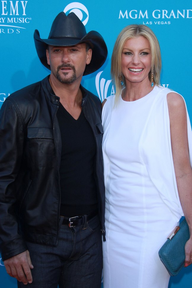 Faith Hill White dress, Tim McGraw Black jacket, black cowboy hat